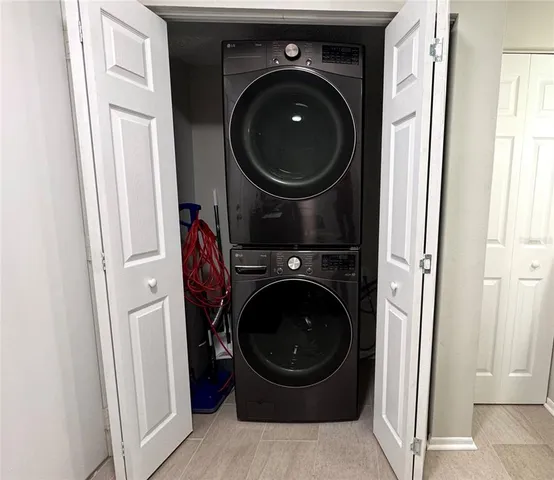 a view of a swimming pool with a yard