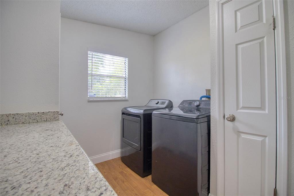 6804 Stafford Road Plant City, FL 33565 - Photo 17 of 24 a room with storage and utility
