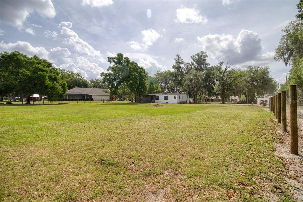6804 Stafford Road Plant City, FL 33565 - Photo 22 of 24 a view of a swimming pool and an outdoor space