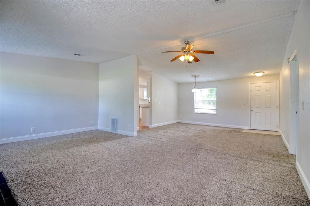 6804 Stafford Road Plant City, FL 33565 - Photo 5 of 24 a view of an empty room with a window