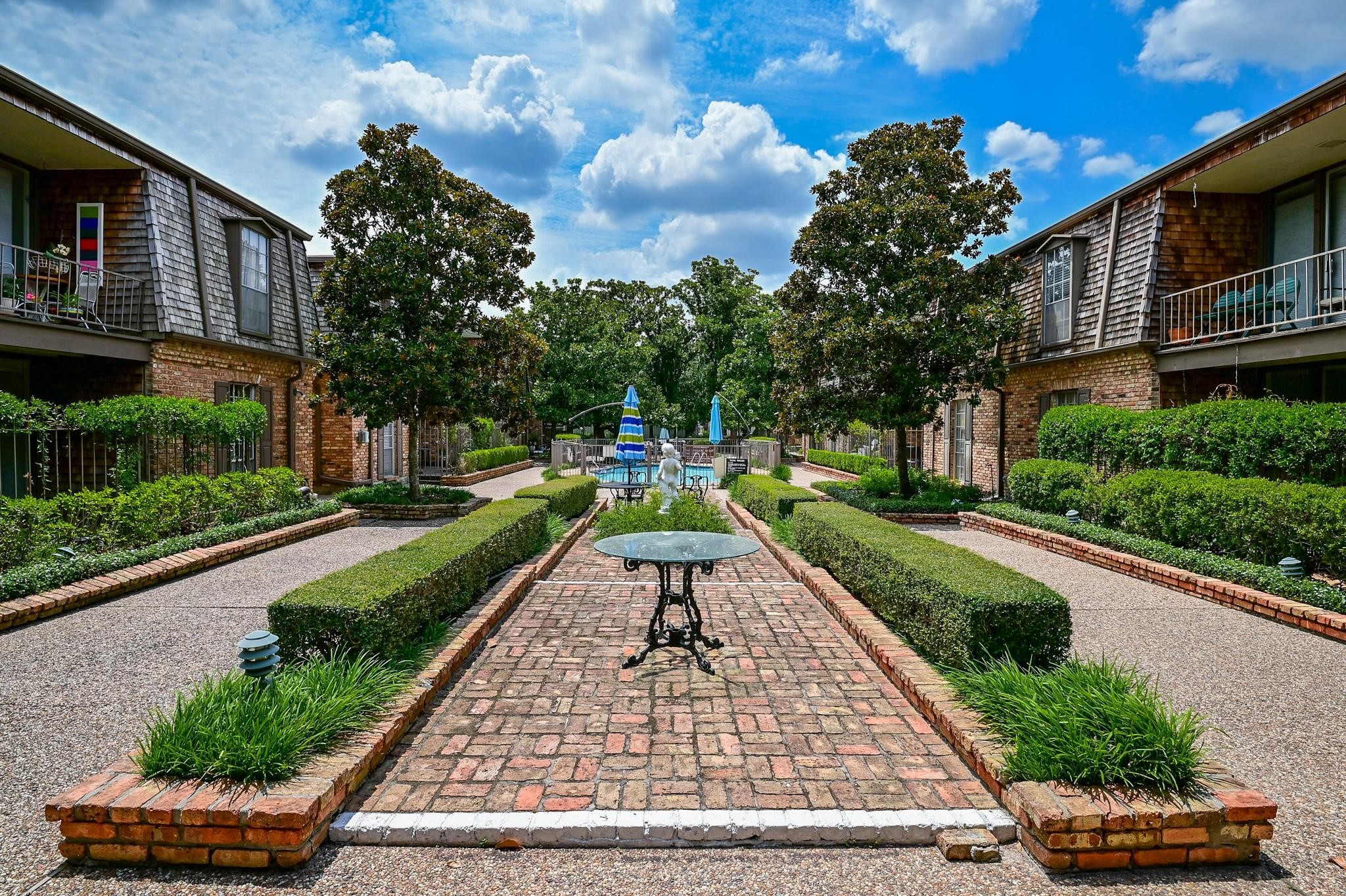 5353 Institute Lane, Unit 12 Houston, TX 77005 - Photo 12 of 15 a swimming pool with barbeque oven outdoor seating and yard
