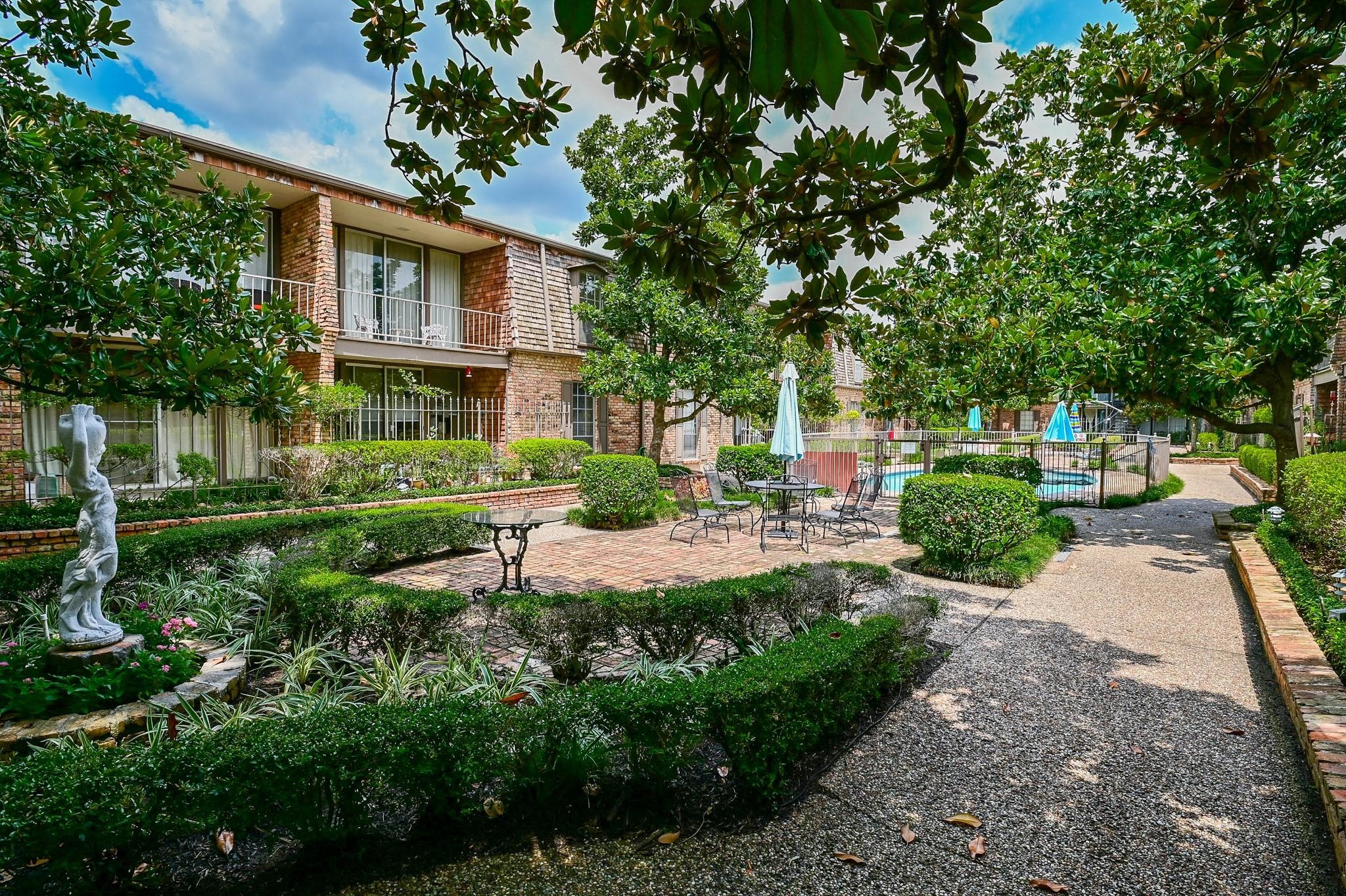 5353 Institute Lane, Unit 12 Houston, TX 77005 - Photo 15 of 15 a view of a house with a yard