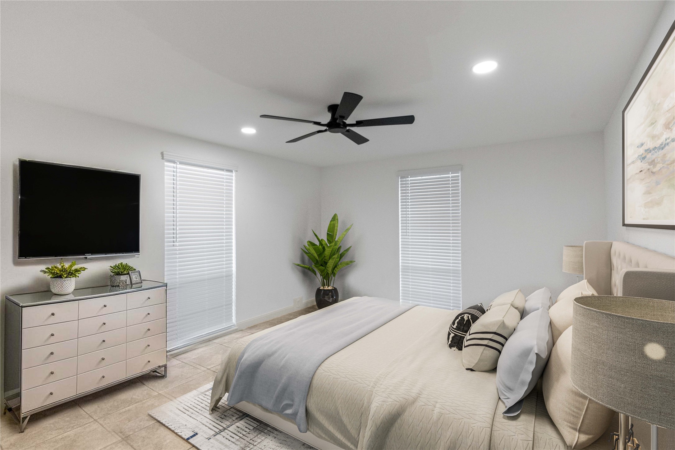 5353 Institute Lane, Unit 12 Houston, TX 77005 - Photo 10 of 15 a bedroom with a bed and a flat screen tv on the dresser