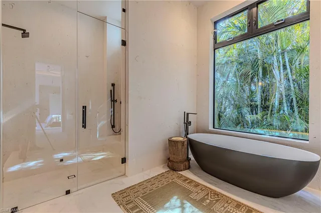a bathroom with a double vanity sink and mirror