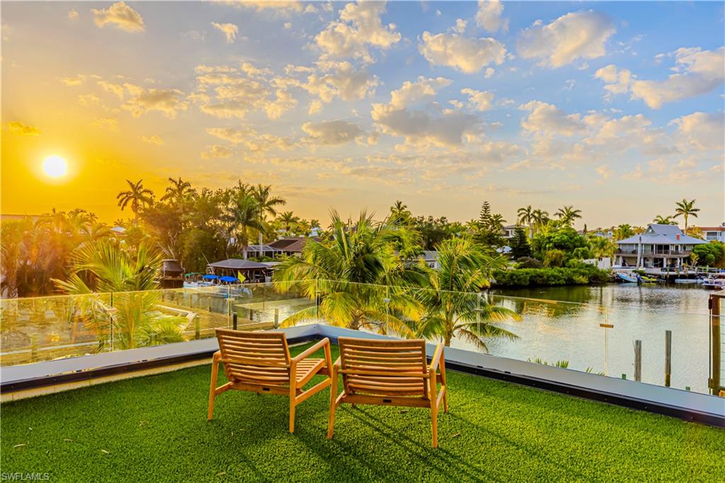 1100 Sandpiper Street Naples, FL 34102 - Photo 6 of 47 Rooftop sunset terrace
