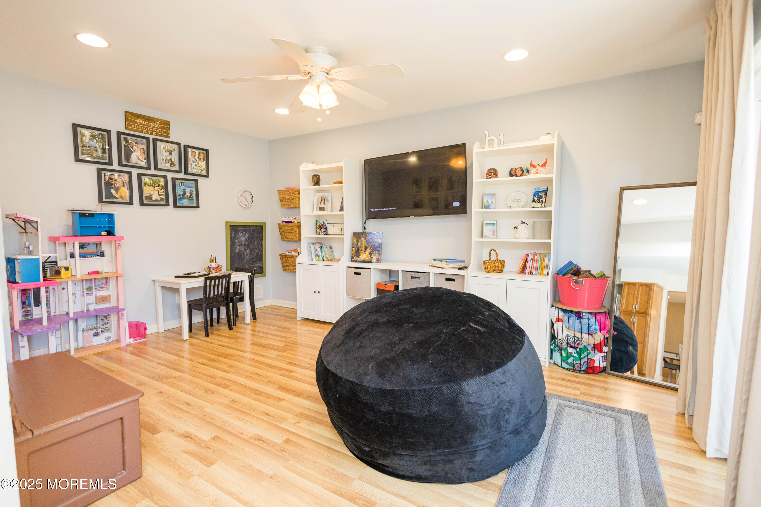 29 Snowdrift Lane Howell, NJ 07731 - Photo 12 of 32 a living room with furniture and a flat screen tv