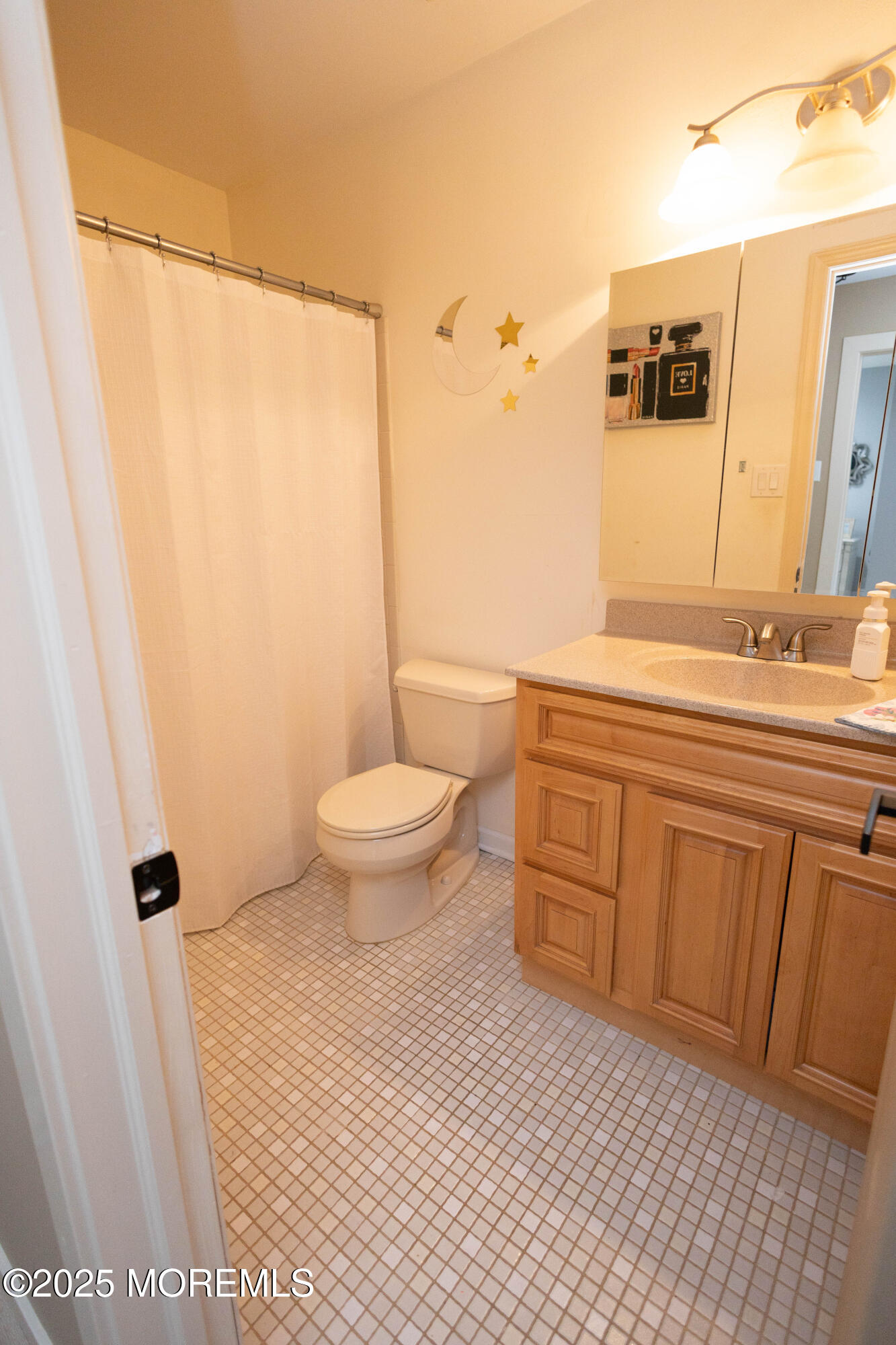 29 Snowdrift Lane Howell, NJ 07731 - Photo 17 of 32 a bathroom with a sink a toilet a mirror and shower