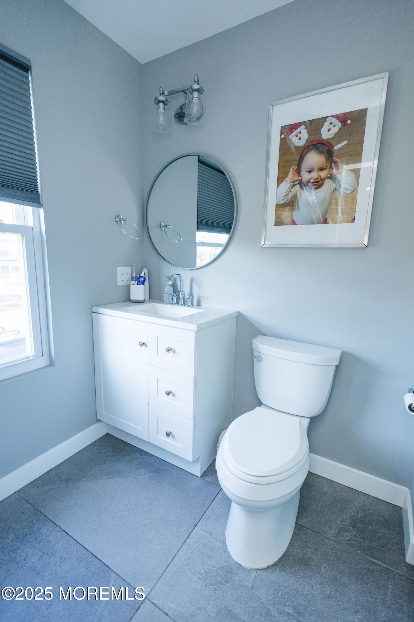 29 Snowdrift Lane Howell, NJ 07731 - Photo 21 of 32 a bathroom with a toilet a sink and a mirror