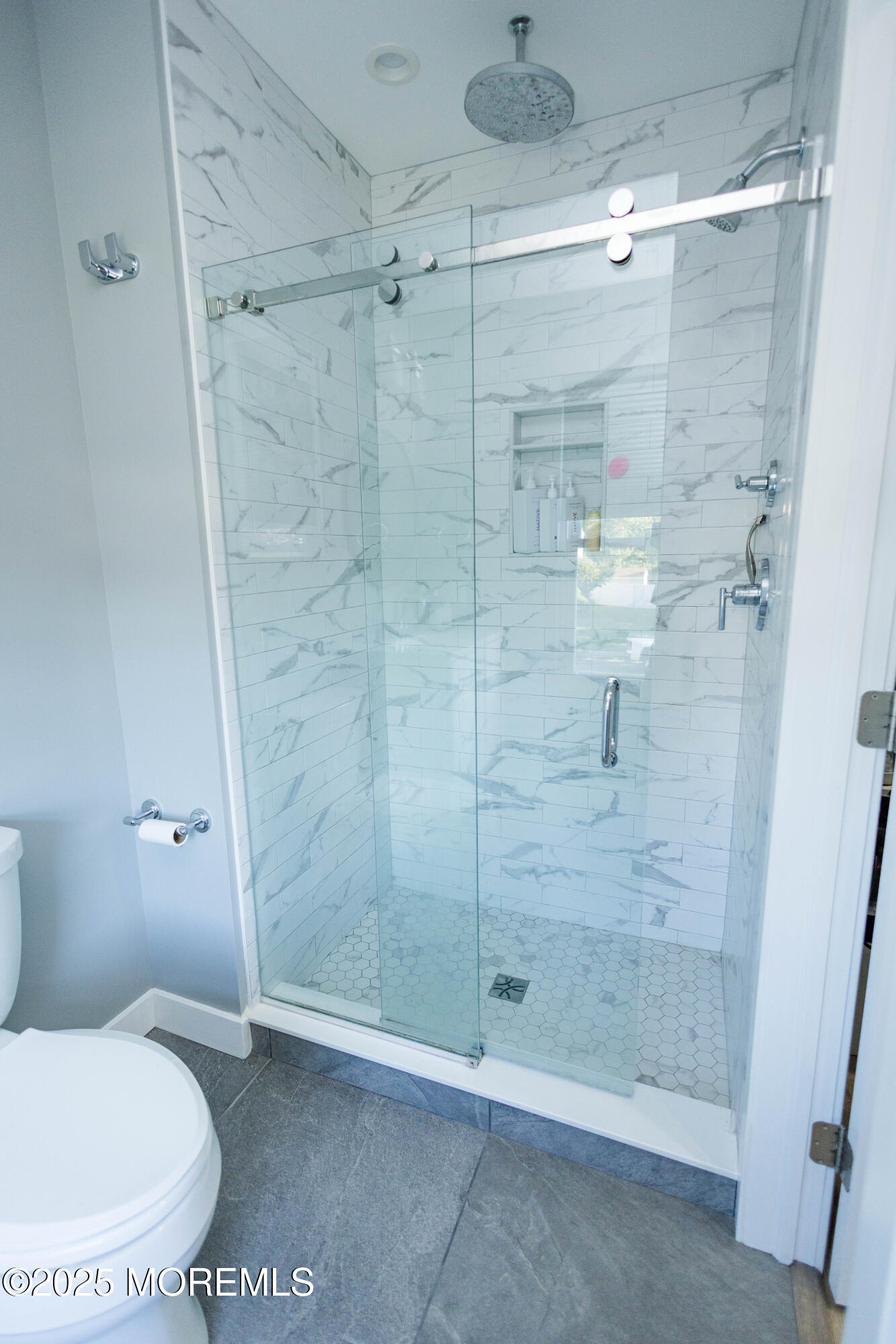 29 Snowdrift Lane Howell, NJ 07731 - Photo 23 of 32 a bathroom with a shower and a toilet