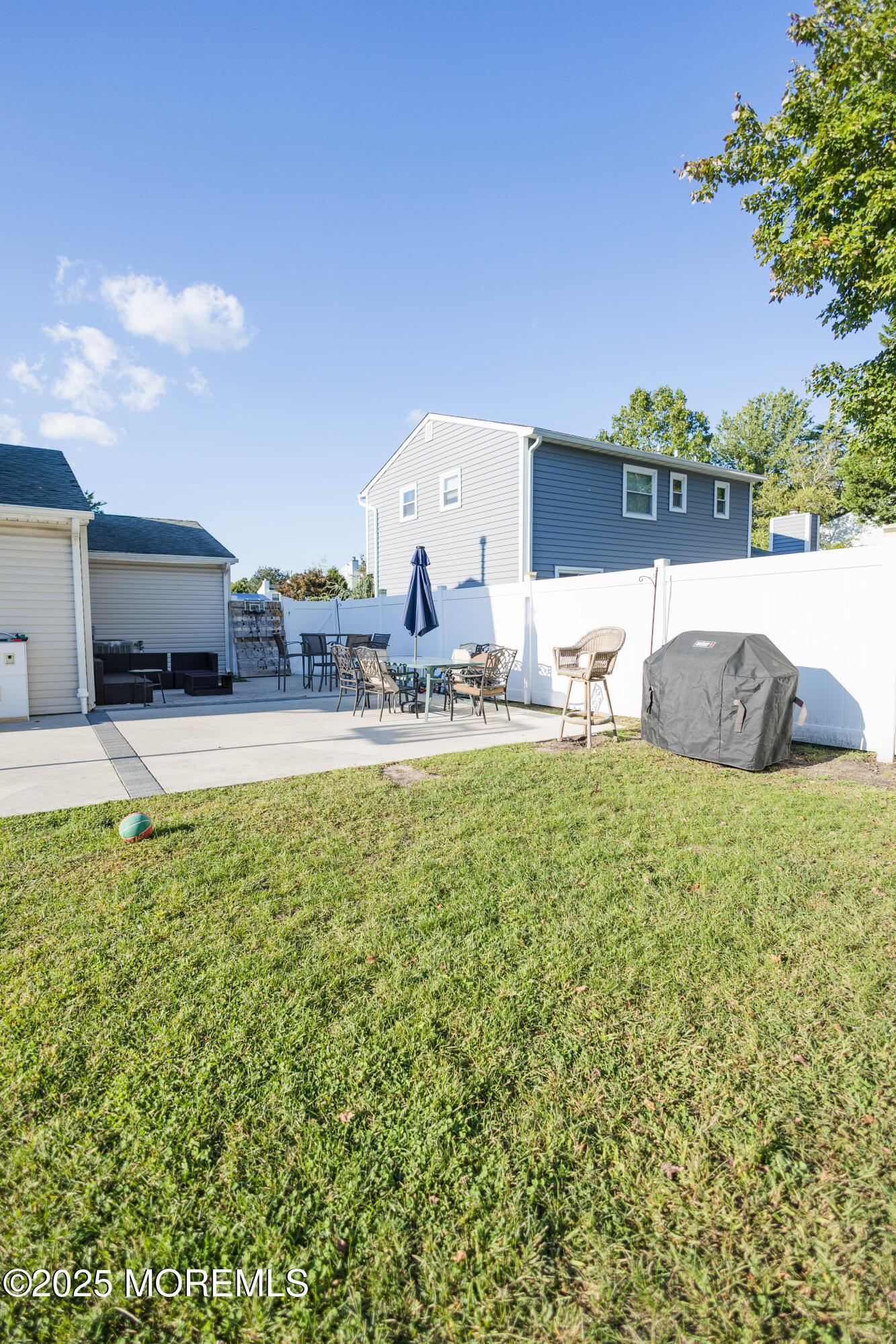 29 Snowdrift Lane Howell, NJ 07731 - Photo 31 of 32 a swimming pool with outdoor seating and yard