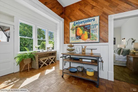 a room with furniture and wooden floor