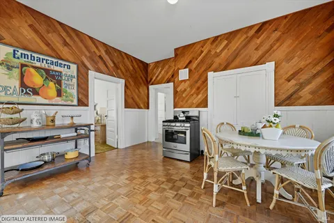 a view of a dining room with furniture