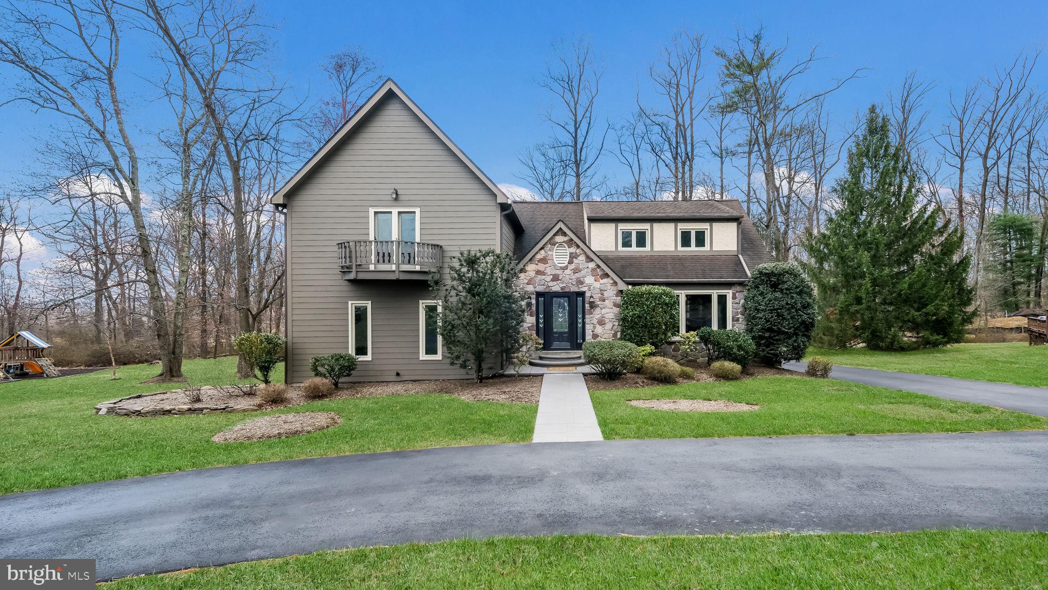 35 Declaration Drive Newtown, PA 18940 - Photo 1 of 53 a front view of a house with a yard