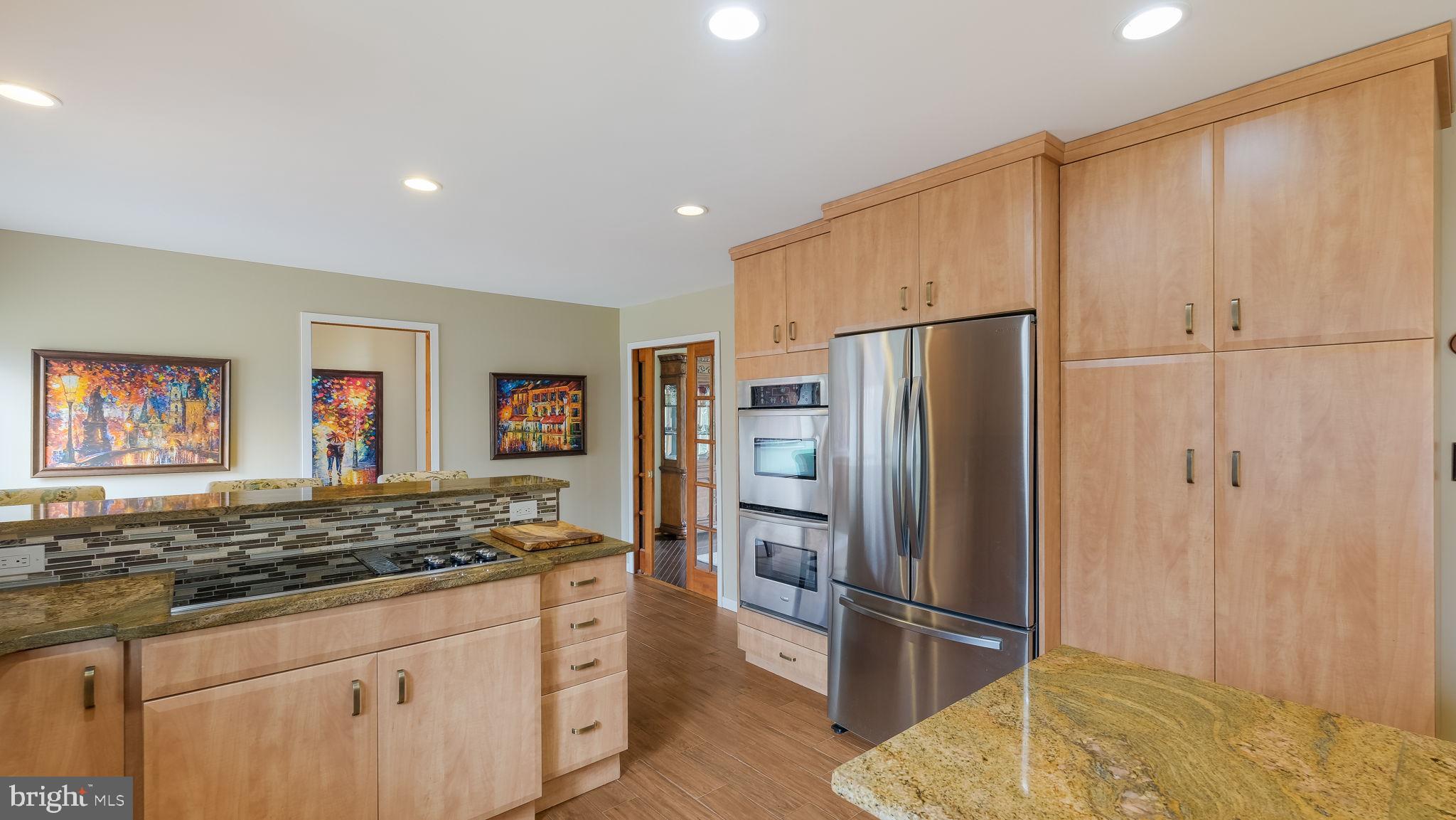 35 Declaration Drive Newtown, PA 18940 - Photo 13 of 53 a kitchen with stainless steel appliances granite countertop a refrigerator and a stove top oven