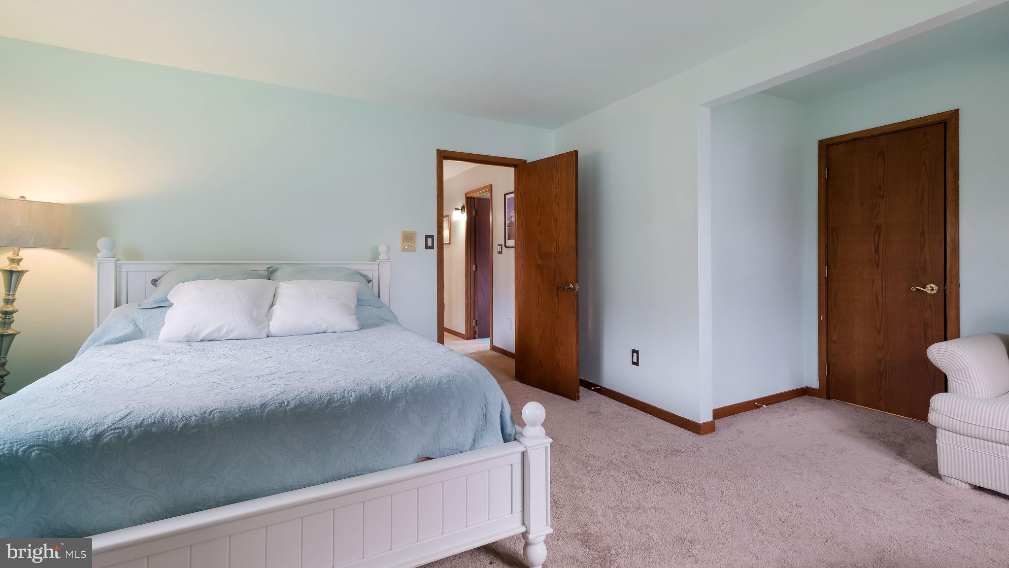 35 Declaration Drive Newtown, PA 18940 - Photo 27 of 53 a bedroom with a bed and a lamp