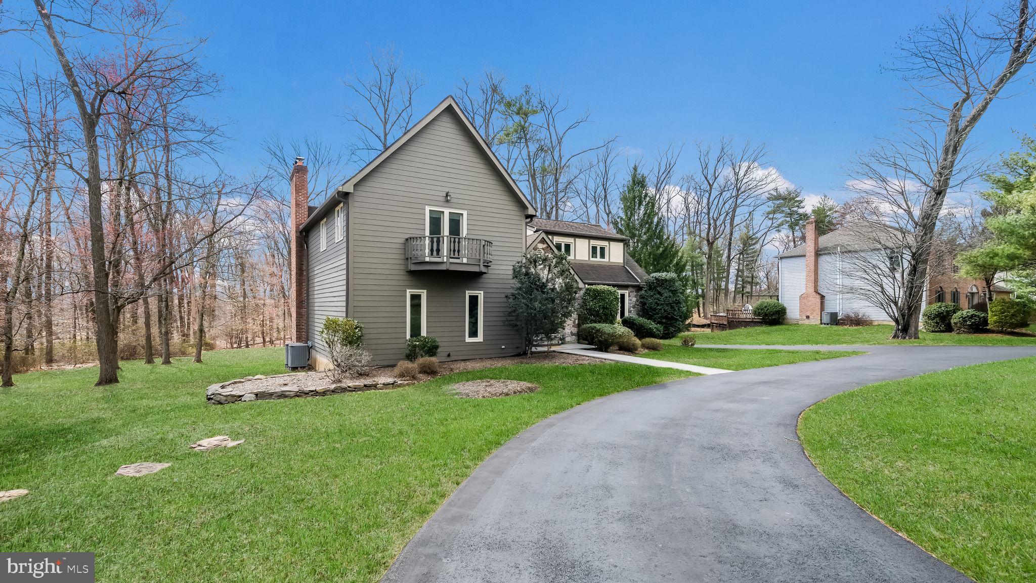 35 Declaration Drive Newtown, PA 18940 - Photo 3 of 53 a front view of a house with a yard table and chairs