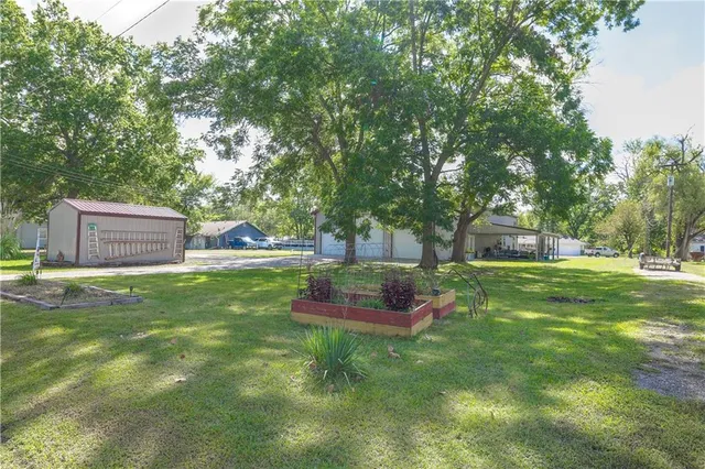 $520,000 | 105 Hebar Street, East Lynne, MO 64743