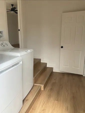 a view of kitchen and utility room