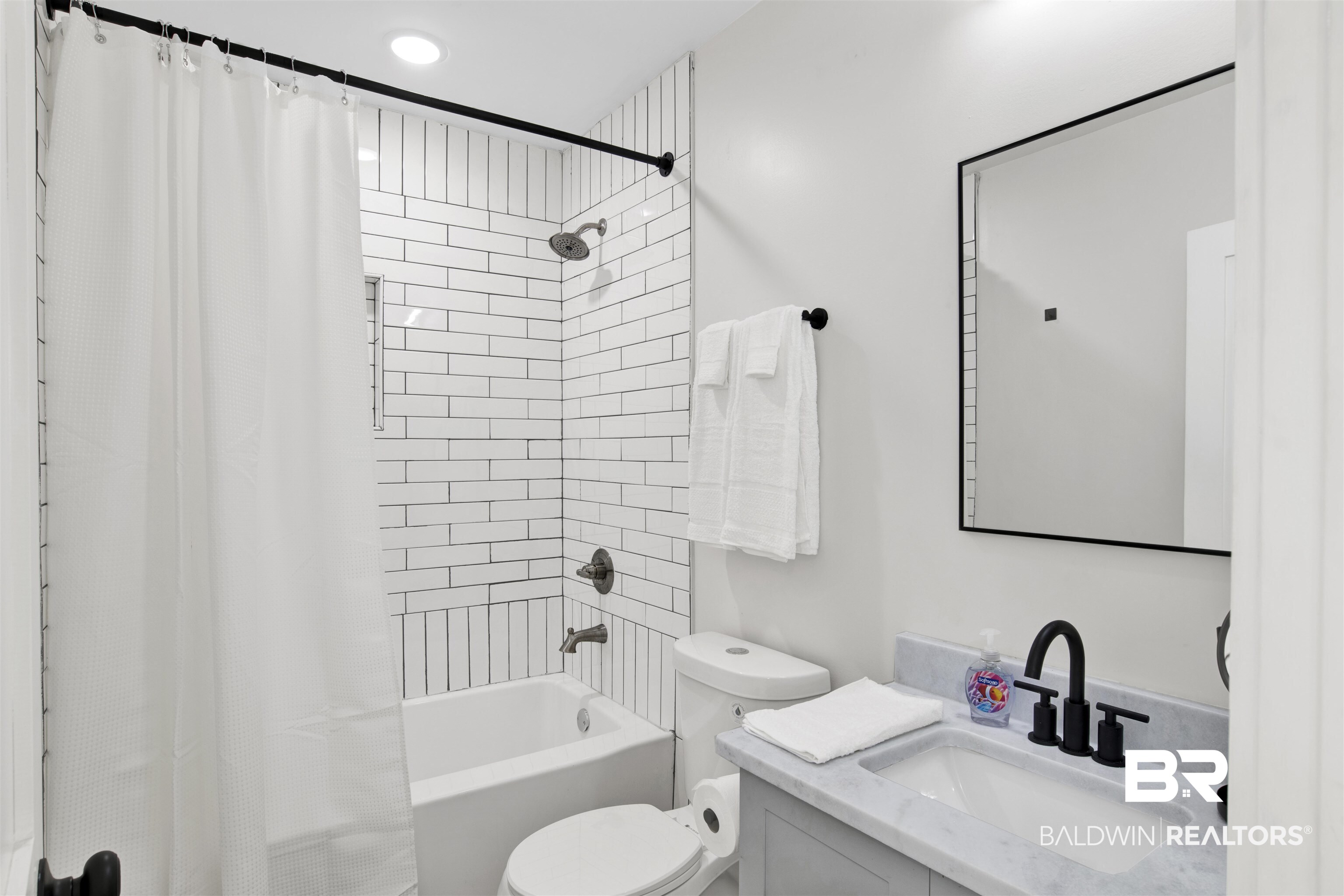 551 Congress Street Mobile, AL 36603 - Photo 14 of 19 Bathroom with vanity and shower / bath combo with shower curtain