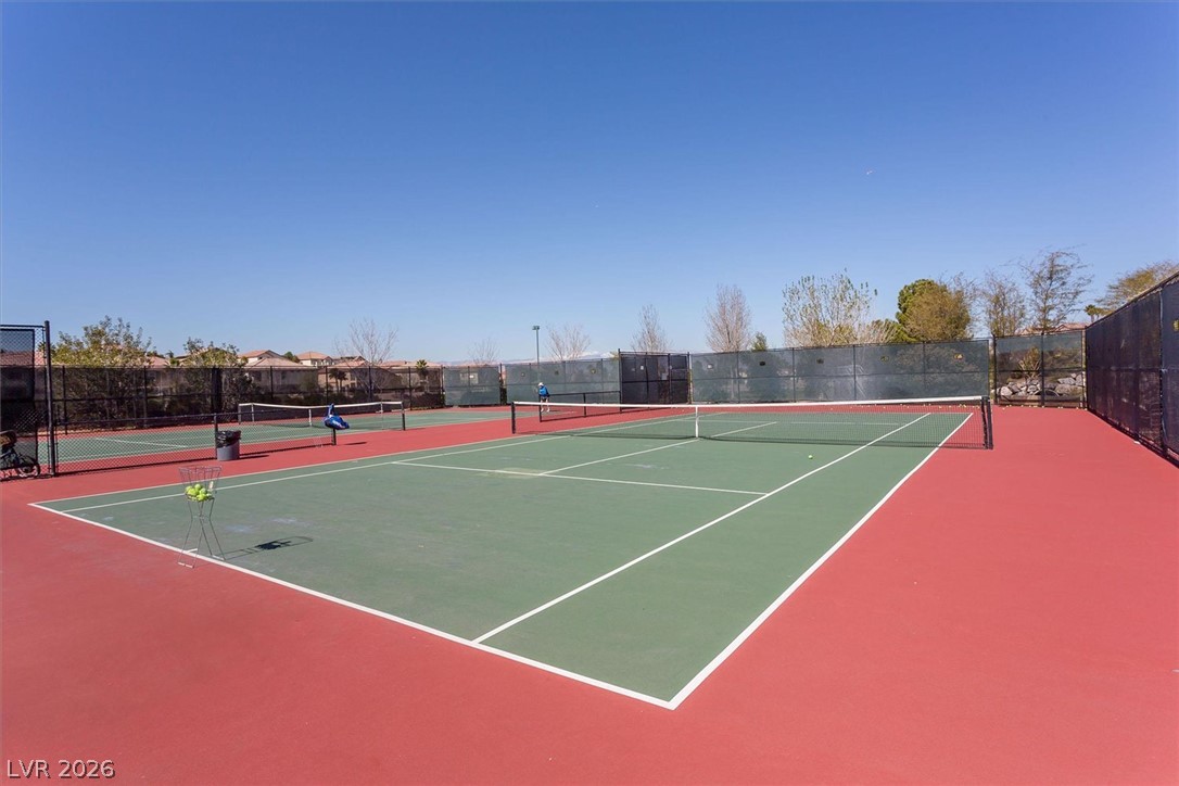 1259 Moon Vision Street Henderson, NV 89052 - Photo 44 of 53 Serve up fun on these well-maintained tennis courts, ready for play under the clear sky.