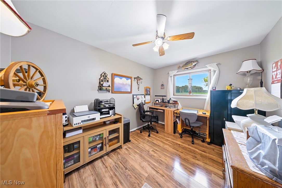 5834 Dickson Road New Washington, OH 44854 - Photo 25 of 40 Home office with ceiling fan and wood finished floors