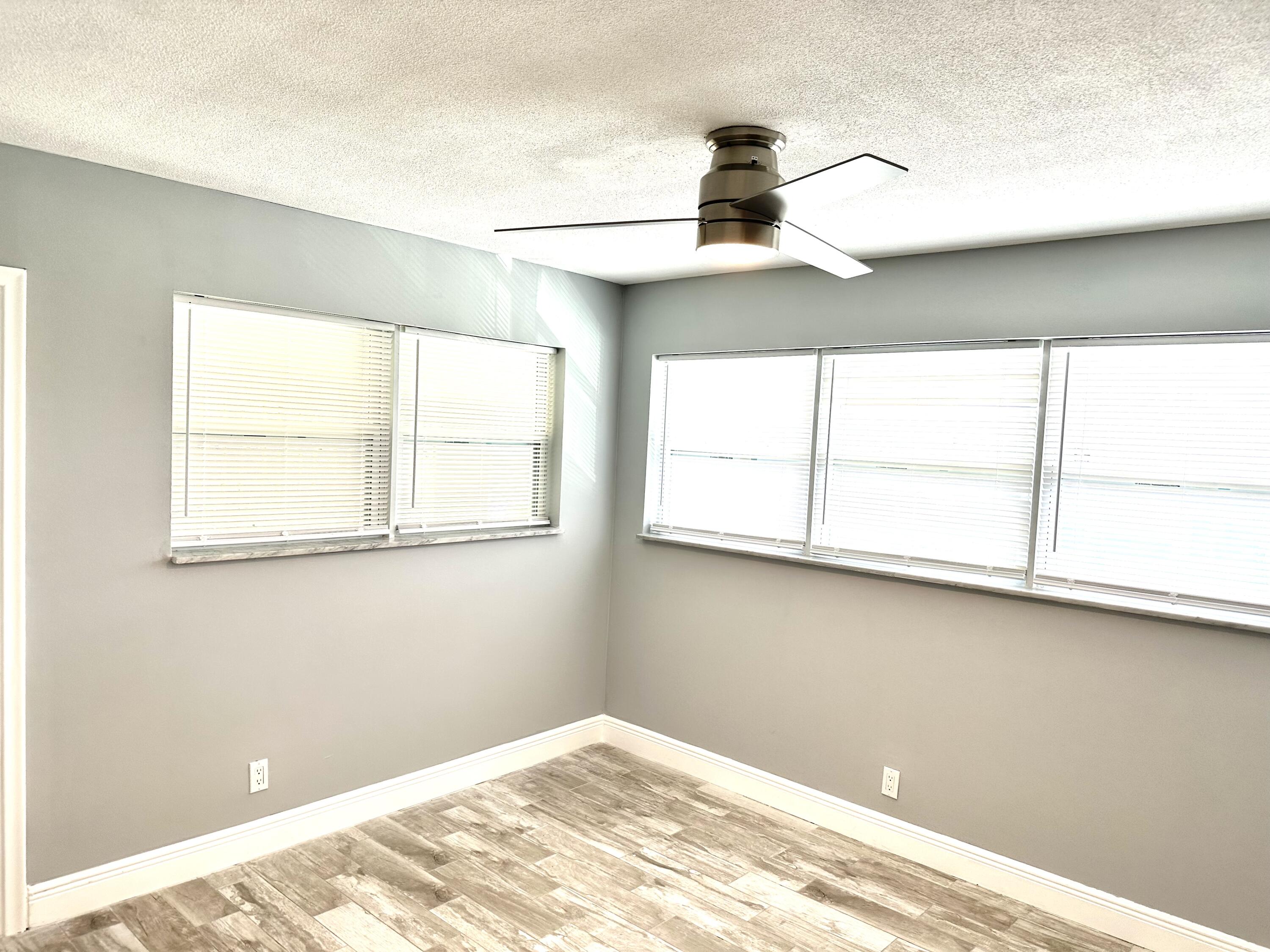 2162 Northeast 36th Street, Unit 46 Lighthouse Point, FL 33064 - Photo 10 of 15 a view of a window in an empty room