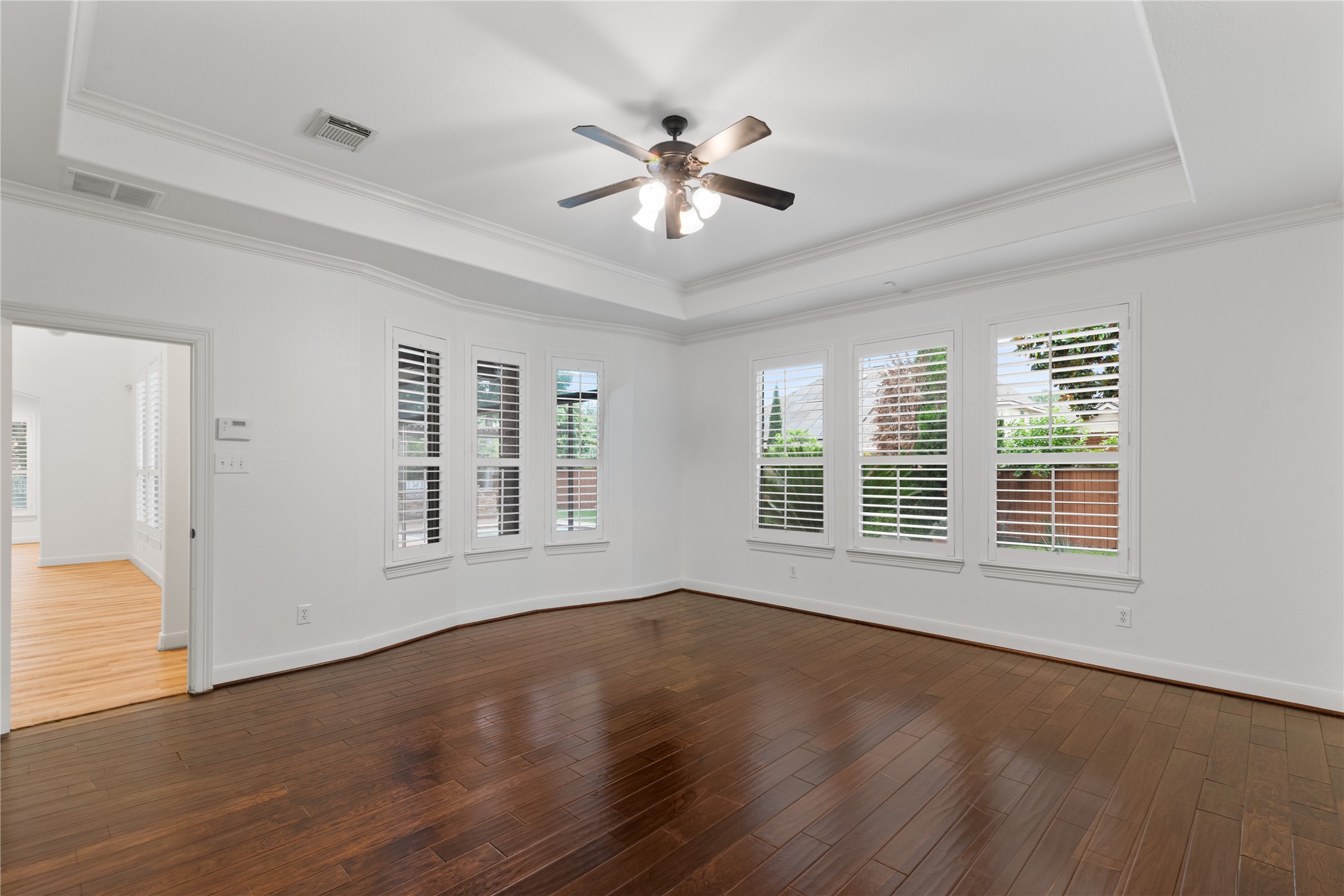 155 South Arrow Canyon Circle Spring, TX 77389 - Photo 20 of 49 a view of an empty room with wooden floor and a window