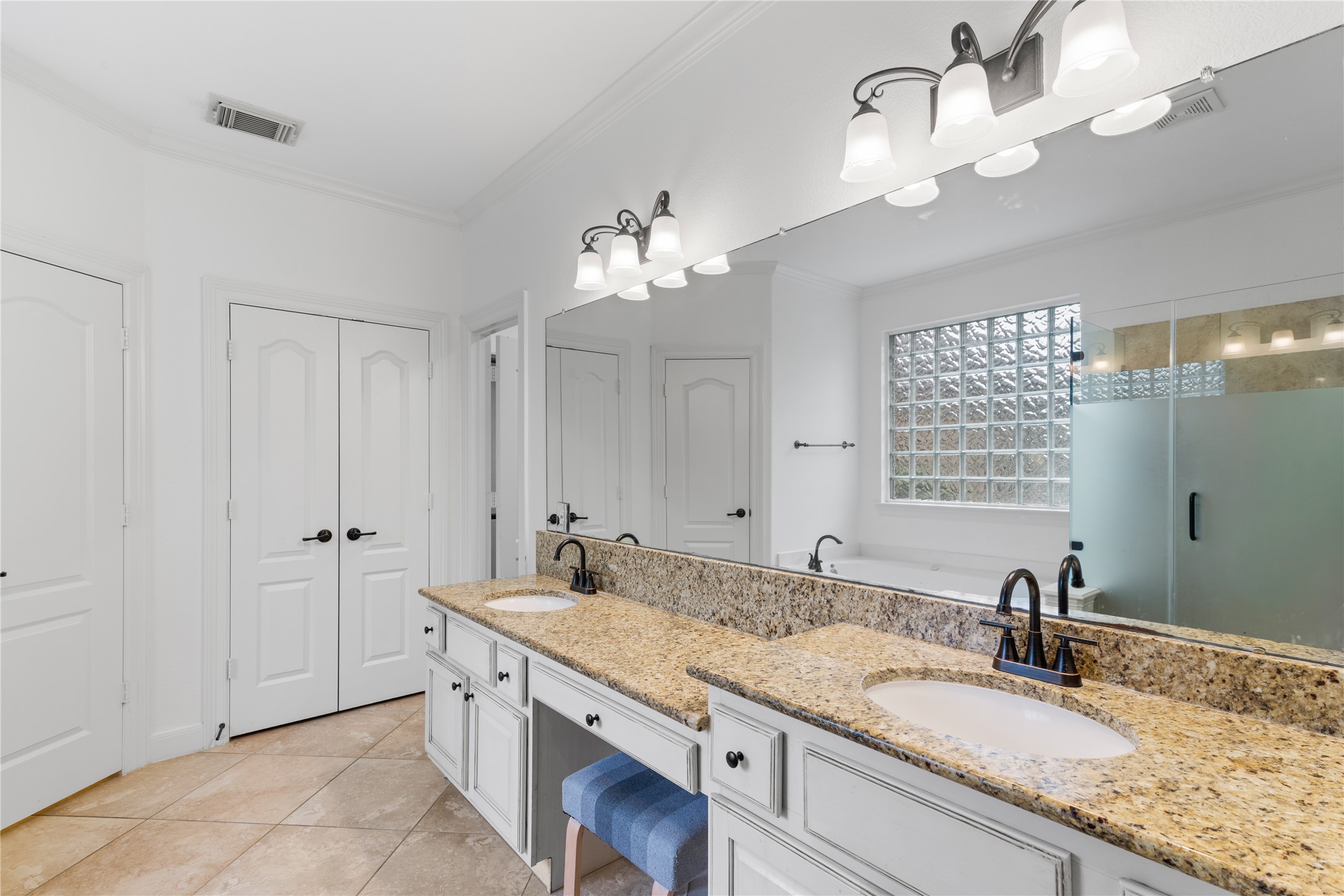 155 South Arrow Canyon Circle Spring, TX 77389 - Photo 21 of 49 a bathroom with a granite countertop double vanity sink and a mirror