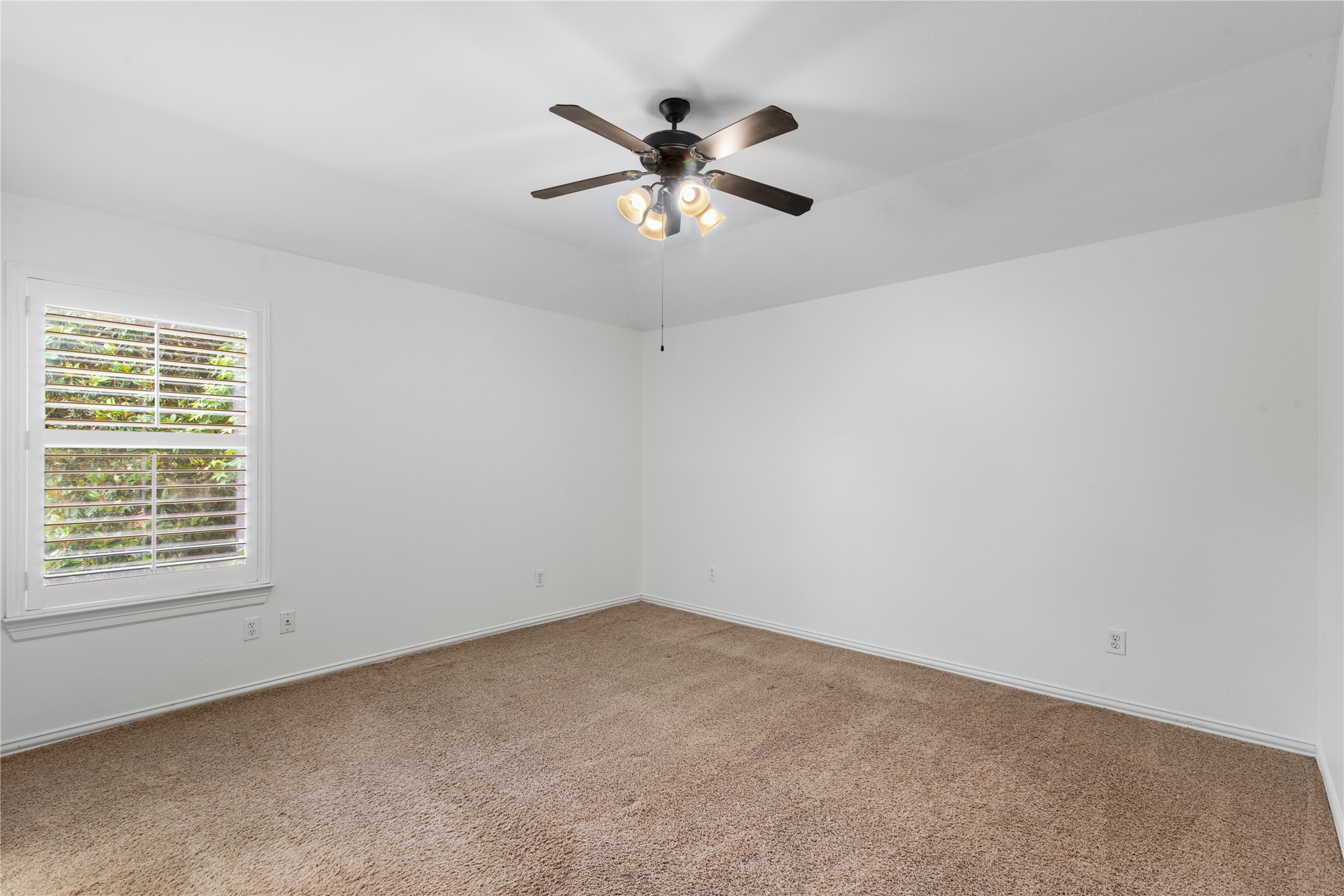 155 South Arrow Canyon Circle Spring, TX 77389 - Photo 32 of 49 an empty room with a window and a fan