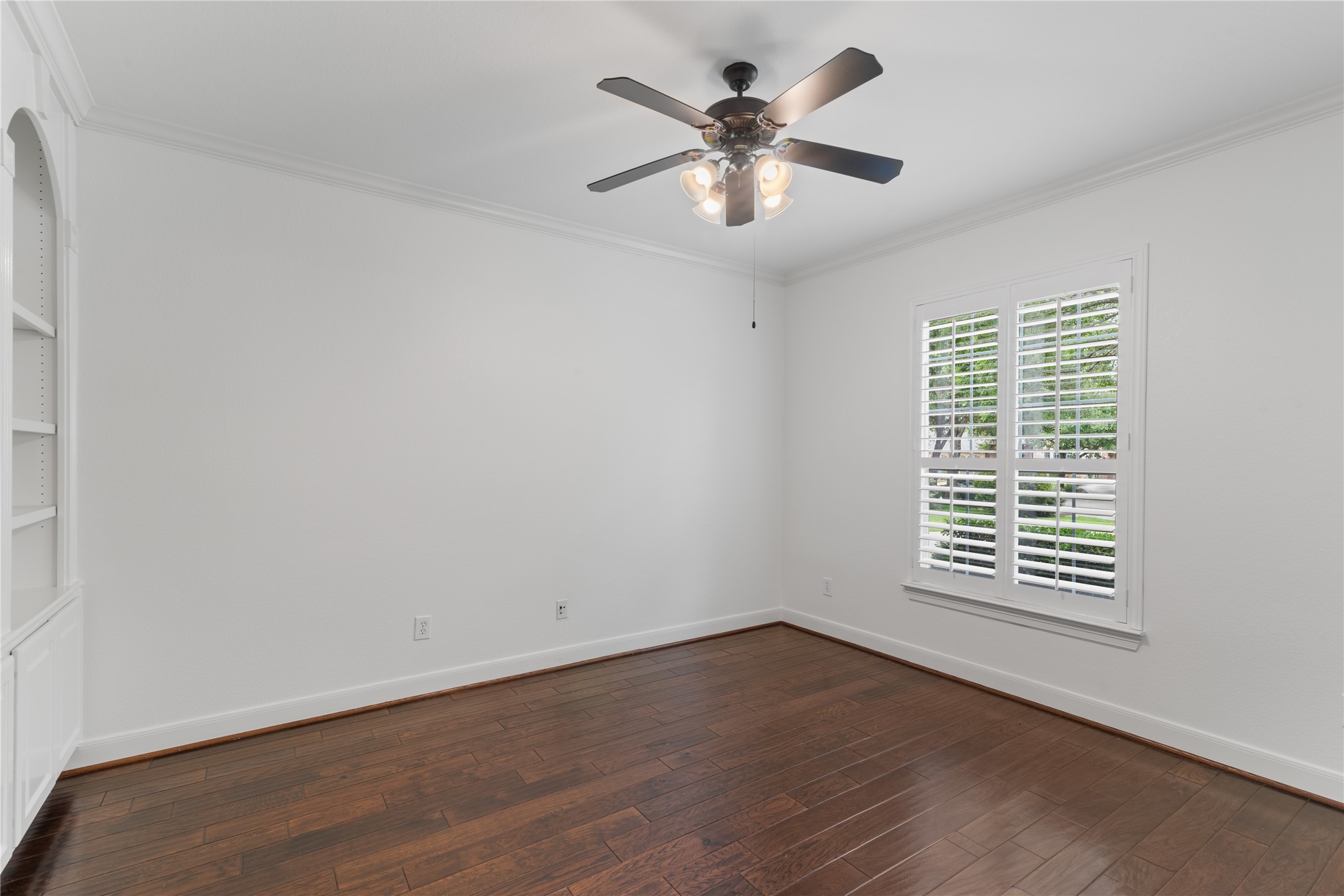 155 South Arrow Canyon Circle Spring, TX 77389 - Photo 6 of 49 an empty room with wooden floor and windows