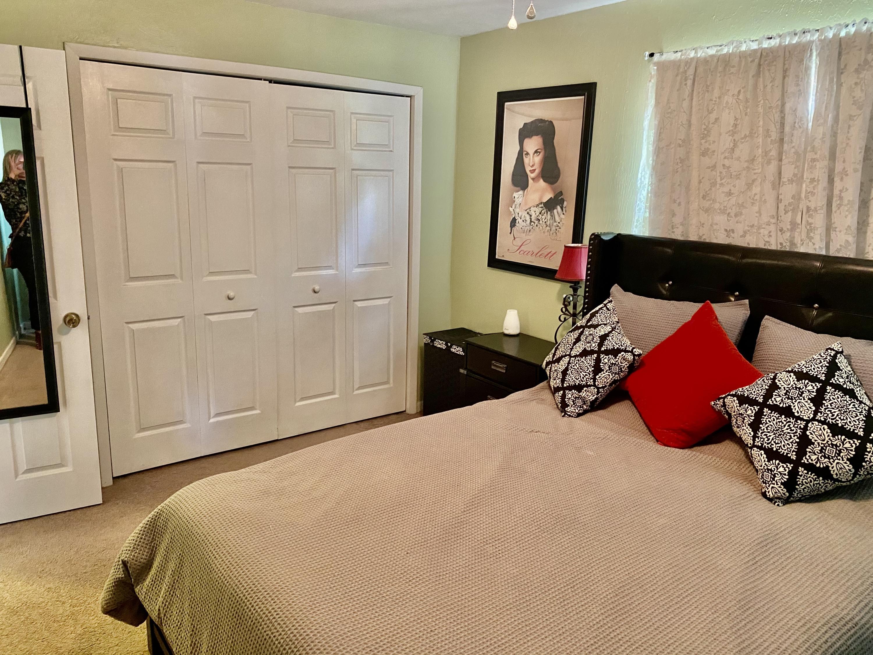 993 Cardon Drive Rockledge, FL 32955 - Photo 18 of 22 a bedroom with a bed and a window