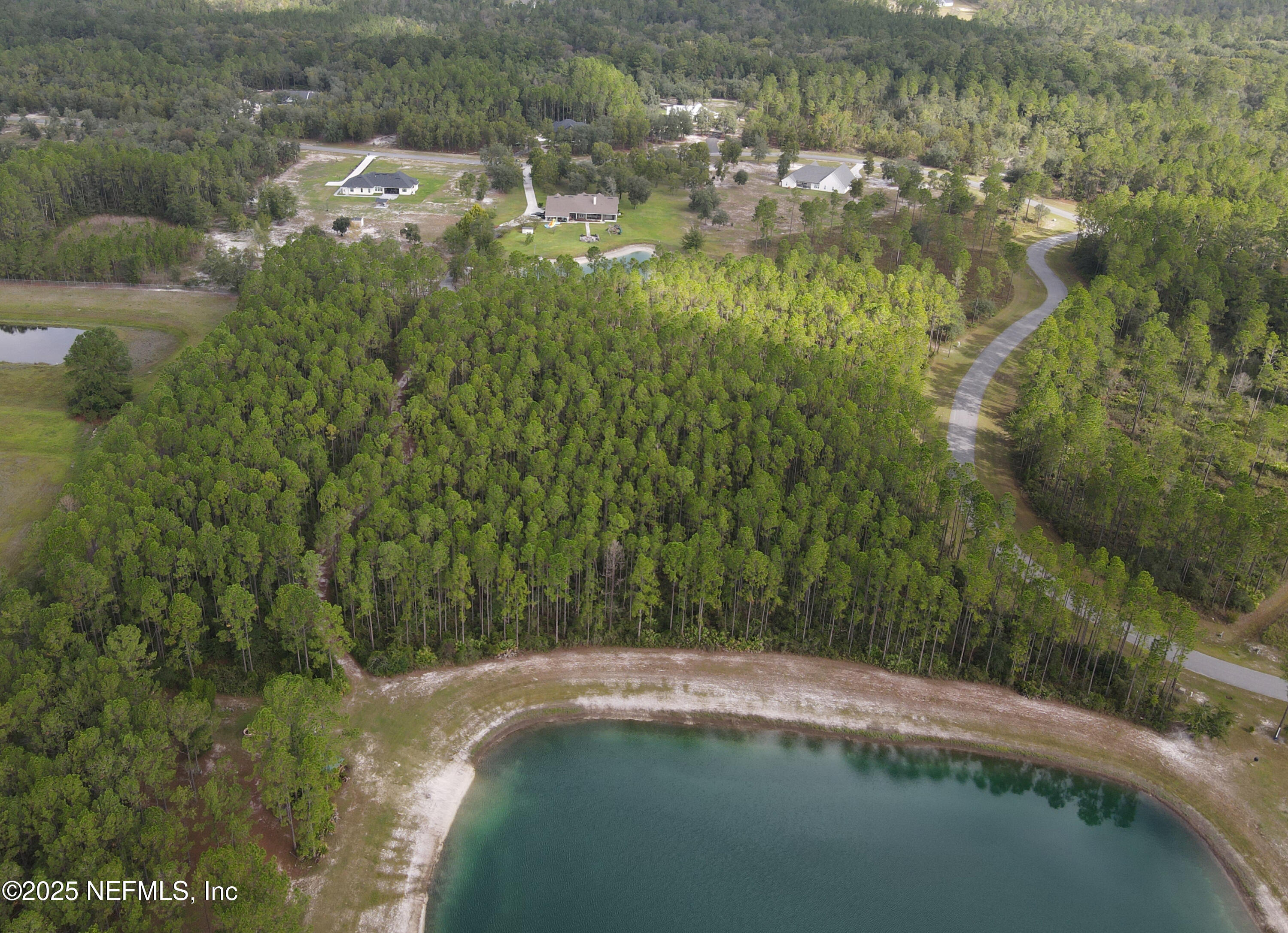 15125 Ingle Road Bryceville, FL 32009 - Photo 2 of 21 a view of a lake view