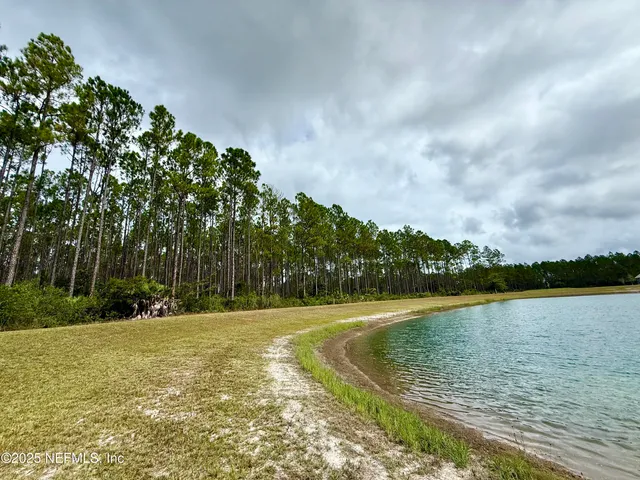 a view of a swimming pool and lake
