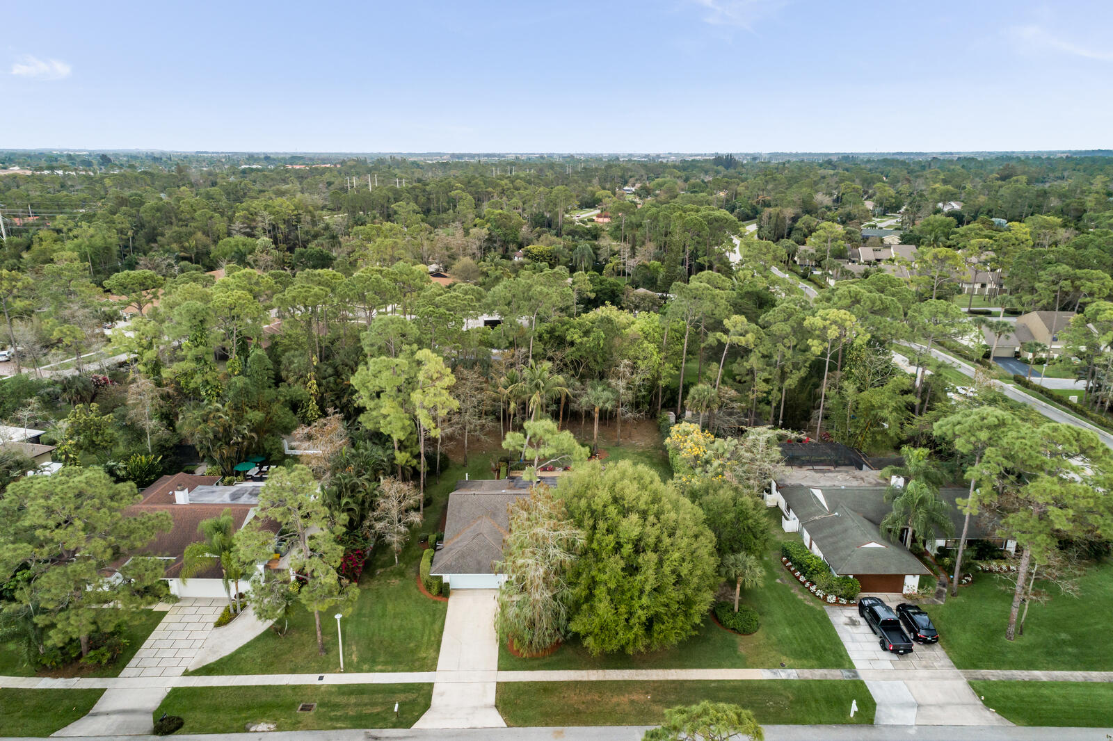 172 Wild Pine Road Wellington, FL 33414 - Photo 35 of 38 an aerial view of a house with a yard