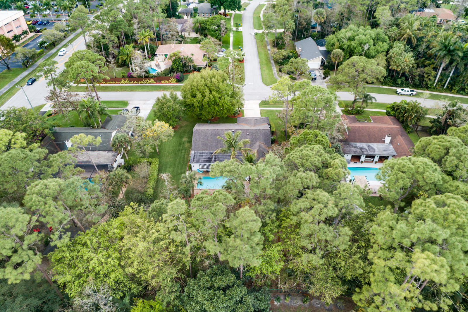 172 Wild Pine Road Wellington, FL 33414 - Photo 38 of 38 an aerial view of residential house with outdoor space and trees all around
