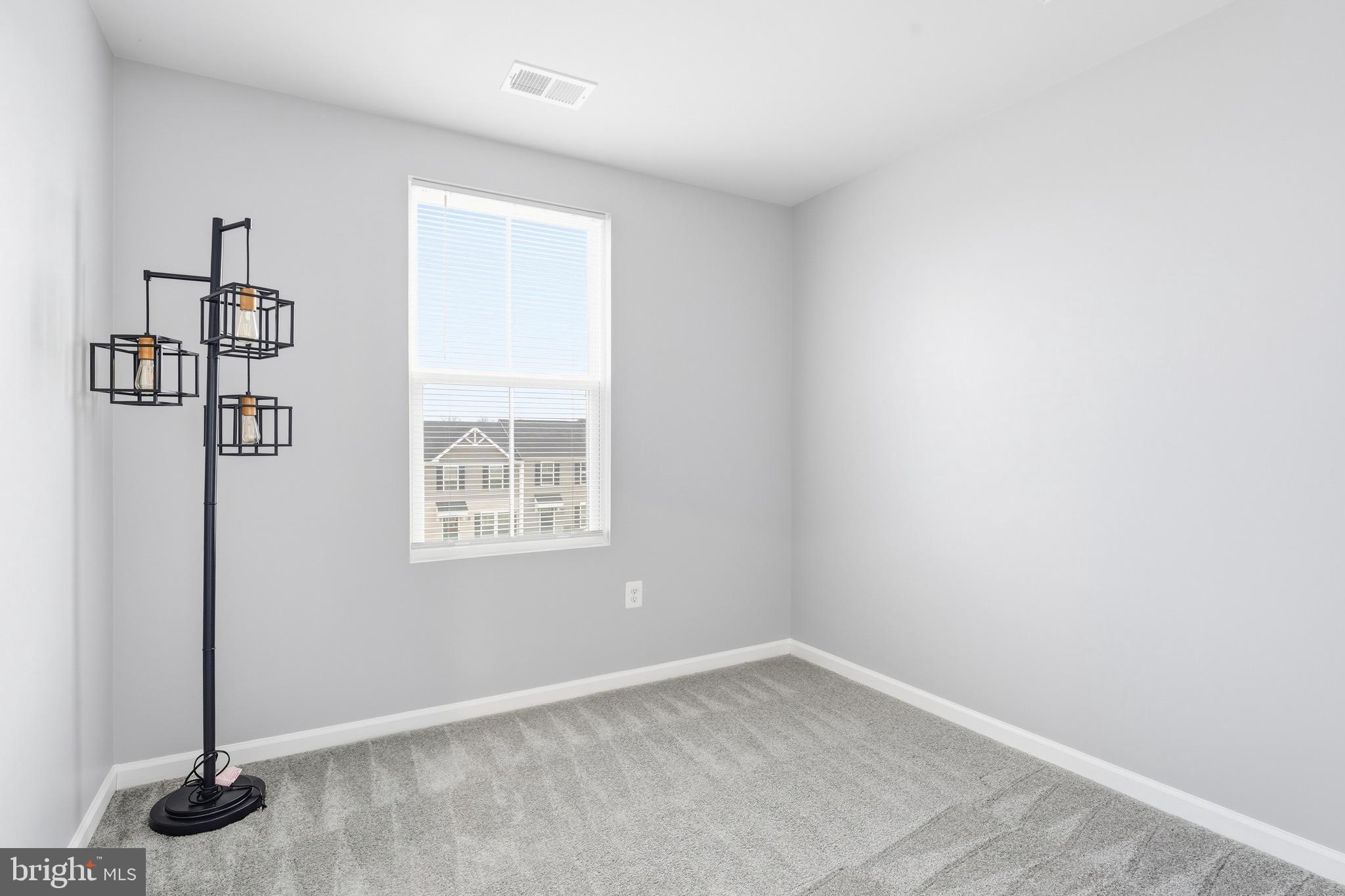 35209 Sara Court Locust Grove, VA 22508 - Photo 11 of 37 an empty room with a window