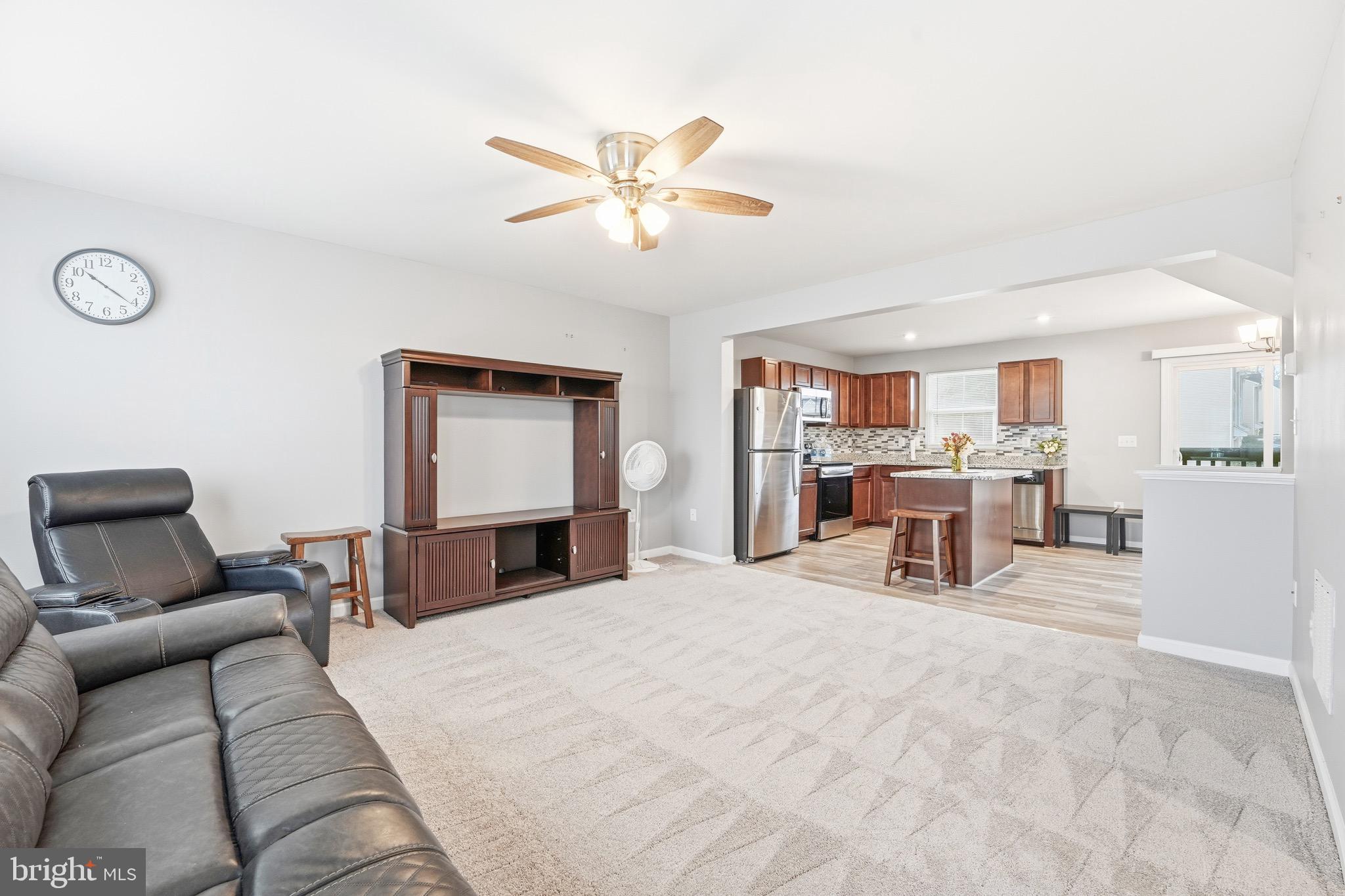 35209 Sara Court Locust Grove, VA 22508 - Photo 14 of 37 a living room with furniture and kitchen view