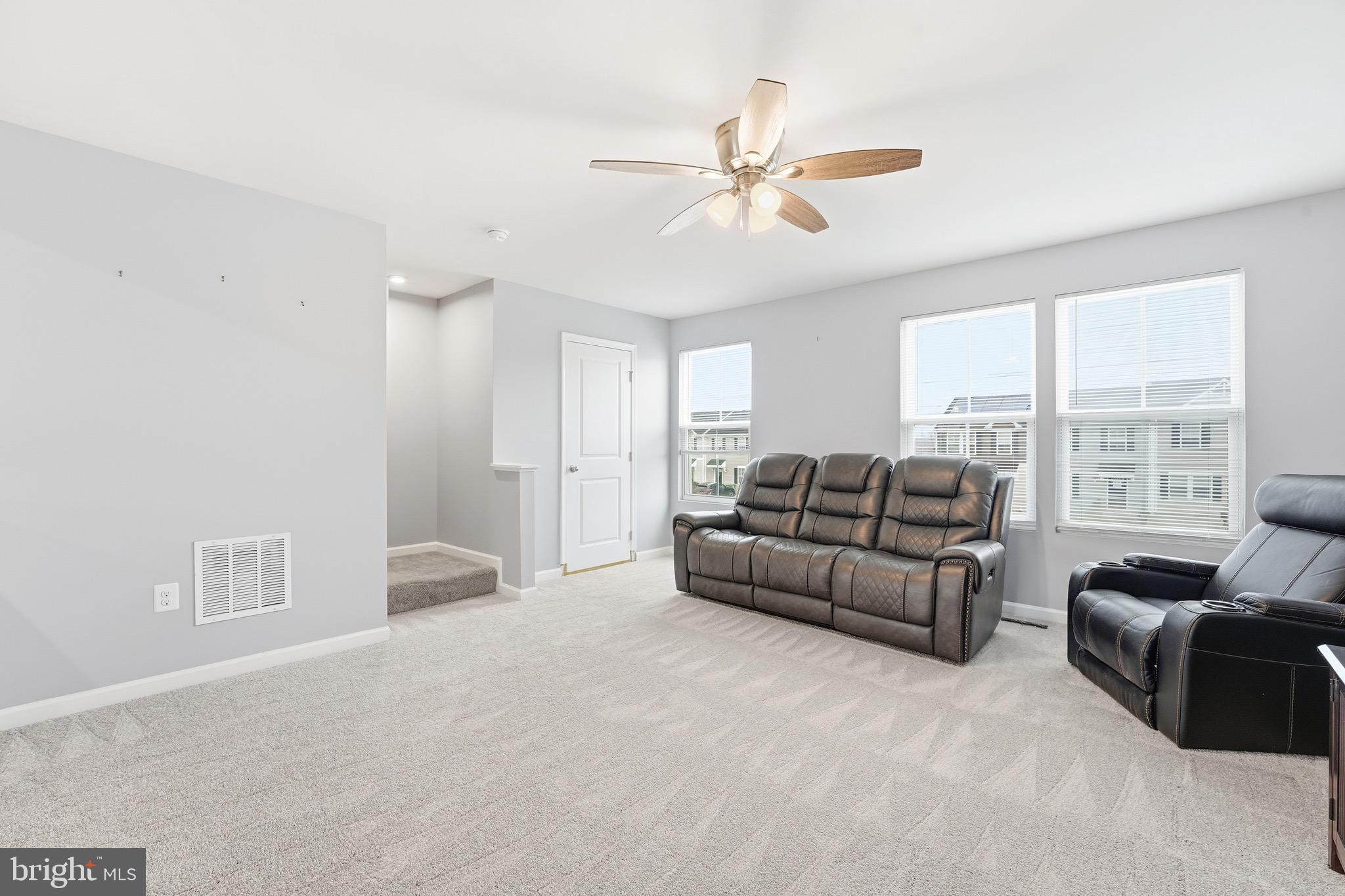 35209 Sara Court Locust Grove, VA 22508 - Photo 15 of 37 a living room with furniture and a large window