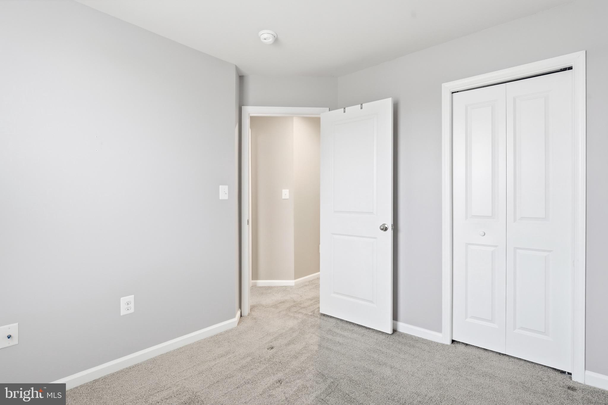 35209 Sara Court Locust Grove, VA 22508 - Photo 8 of 37 an empty room with closet area