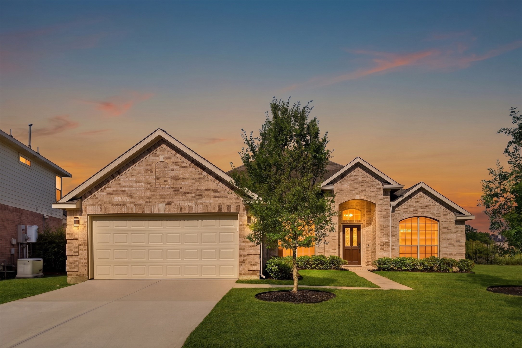 29819 South Legends Village Circle Spring, TX 77386 - Photo 1 of 48 a front view of a house with a yard and garage
