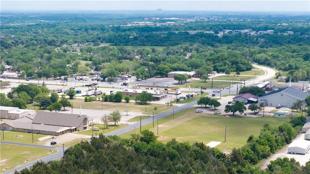 1801 Tabor Road Bryan, TX 77803 - Photo 12 of 15 an aerial view of residential houses with outdoor space and trees