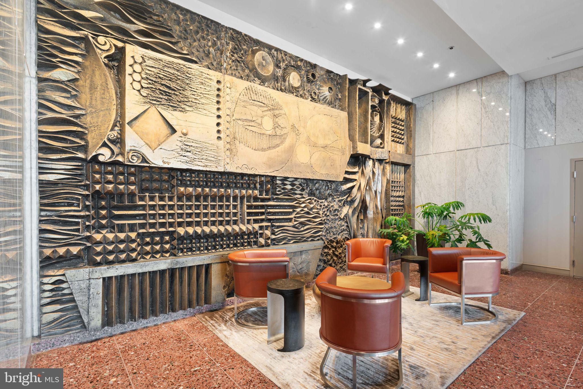 201-59 North 8th Street, Unit 603 Philadelphia, PA 19106 - Photo 30 of 35 a balcony with table and chairs