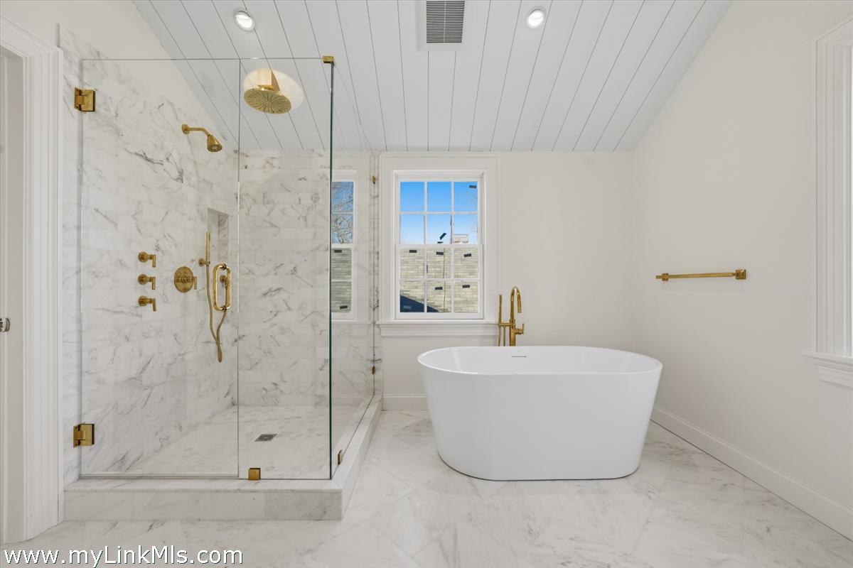 85 Orange Street Nantucket, MA 02554 - Photo 61 of 89 a bathroom with a sink a mirror and shower