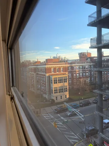 a view of a balcony with city view