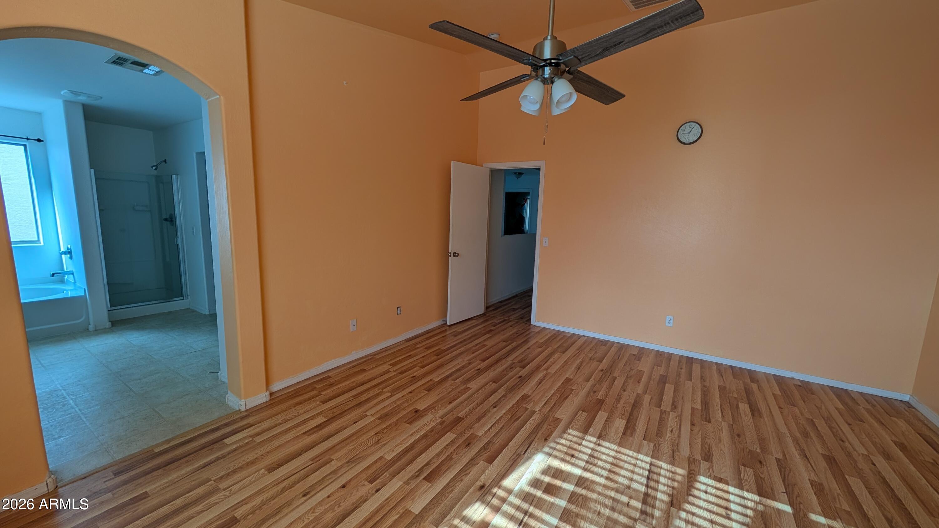 13229 East Primrose Lane Florence, AZ 85132 - Photo 5 of 11 a view of room with wooden floor