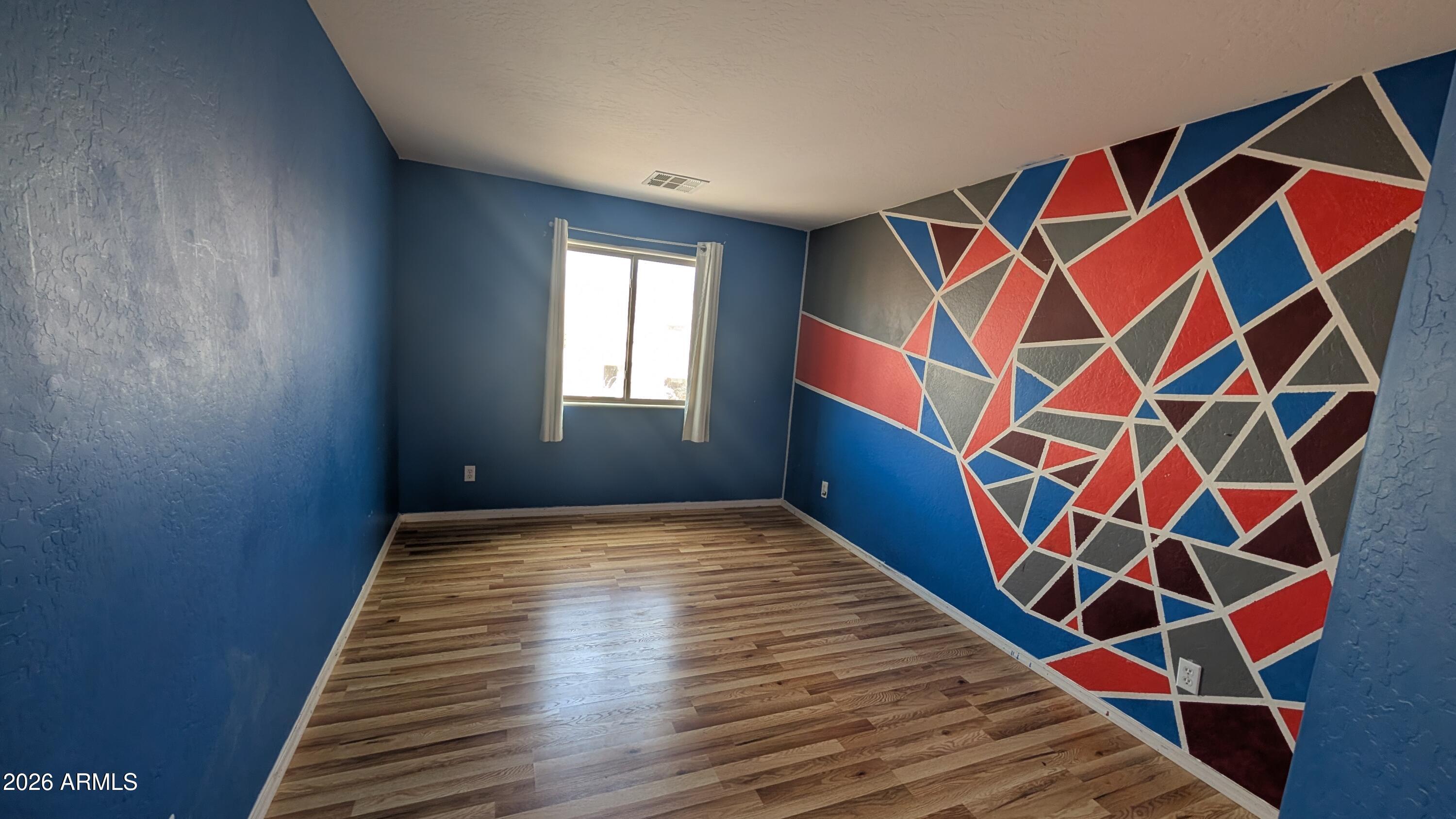 13229 East Primrose Lane Florence, AZ 85132 - Photo 6 of 11 a very nice looking room with windows