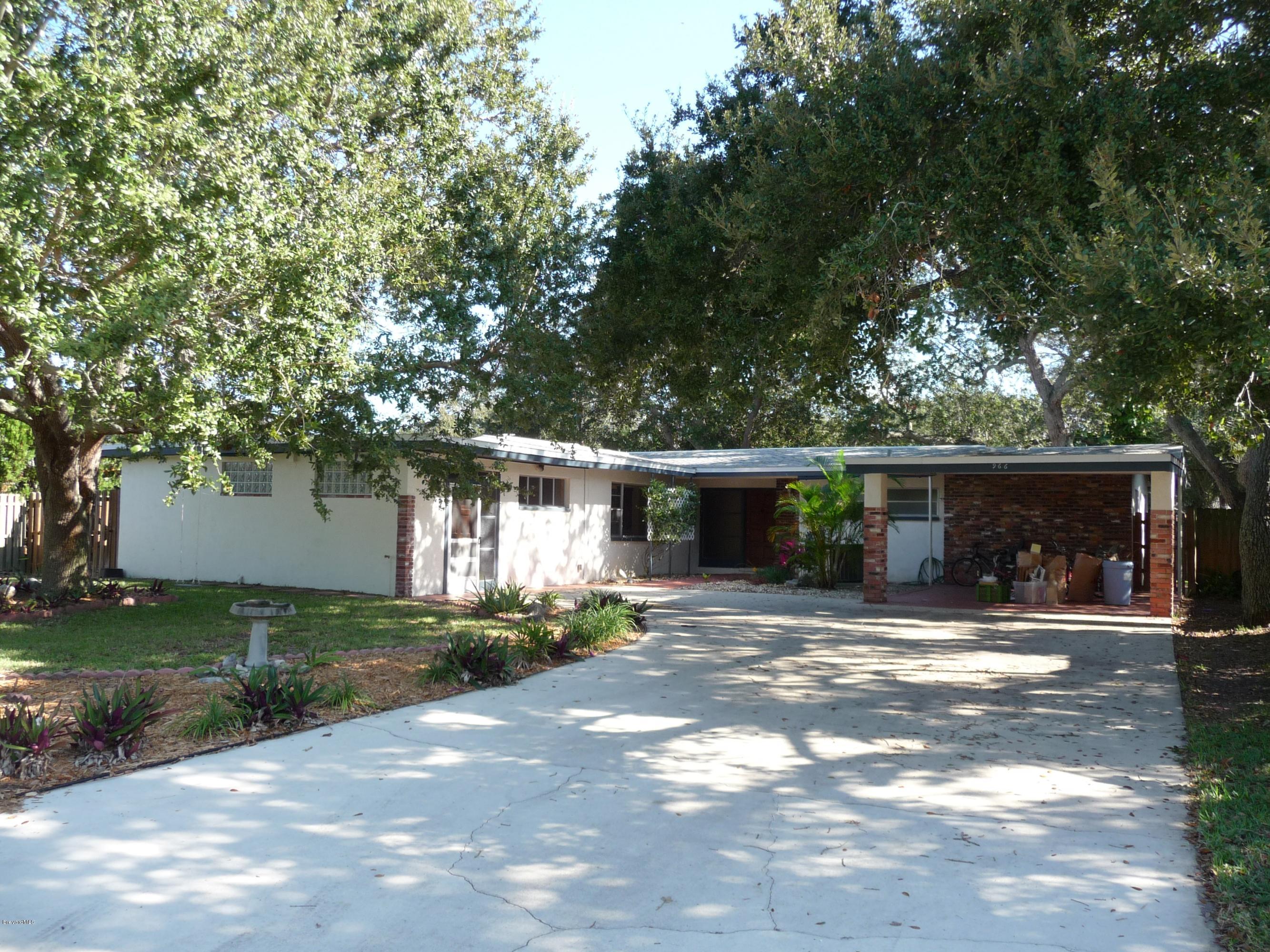 966 Santa Cruz Road Cocoa Beach, FL 32931 - Photo 1 of 12 Great curb appeal. Lots of shade trees.