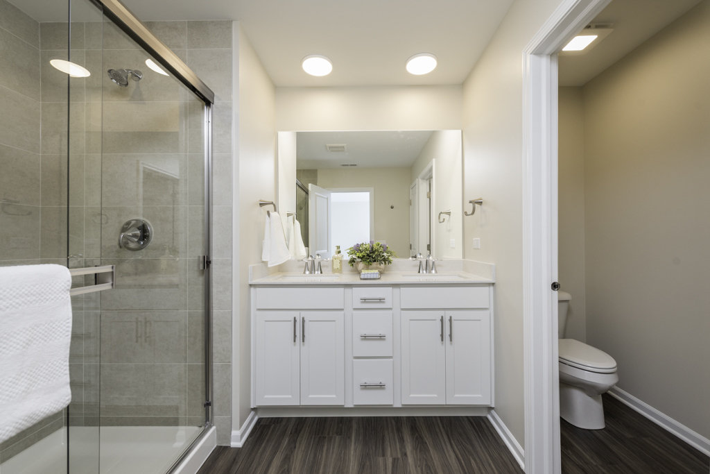 804 Neubauer Circle Lindenhurst, IL 60046 - Photo 14 of 30 a bathroom with a granite countertop sink toilet a shower and a mirror