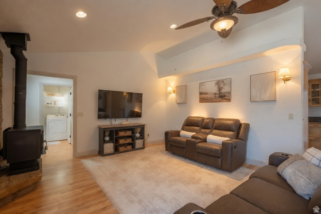 1504 Rome Way Apple Valley, UT 84737 - Photo 3 of 22 Spacious living area featuring wood-finish flooring, a ceiling fan with integrated lighting, recessed lighting, and wall-mounted sconces