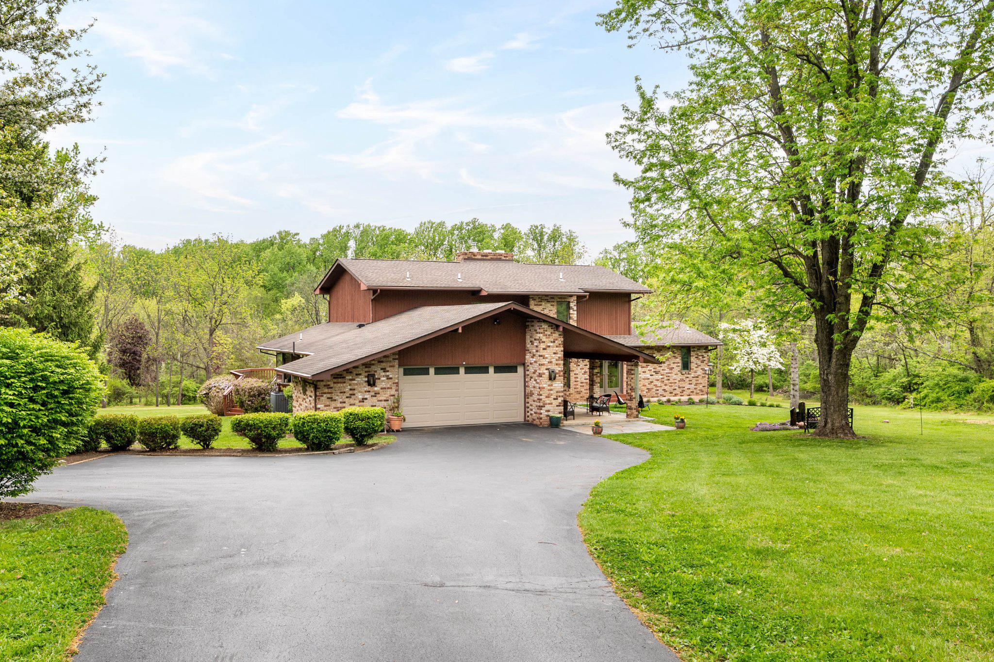 703 Ridge Road Pottstown, PA 19465 - Photo 3 of 68 Surrounded by lush greenery and expansive yard